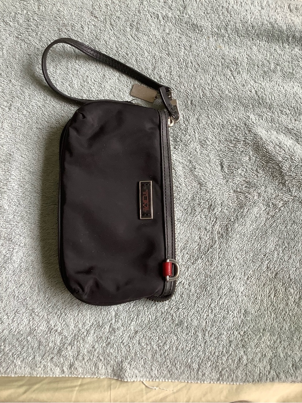 Tumi Black Nylon Wristlet with Red Accent